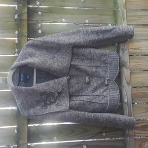 Insight jacket, convertible collar with laser cut detail.